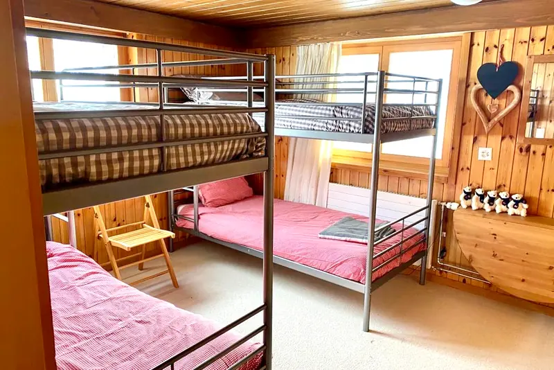 Room with two bunk beds