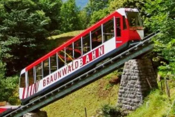 The red Braunwaldbahn on its steep track